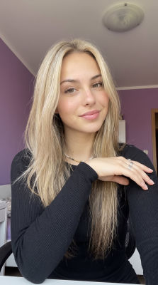 AI-generated image of a woman in a black top