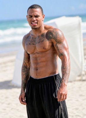 Deepfake of Chris Brown shirtless on a beach