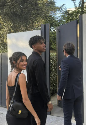 AI-generated image appearing to show  Lamine Yamal and two companions at an event entrance