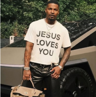 AI-generated image of Jamie Foxx standing by a Tesla Cybertruck