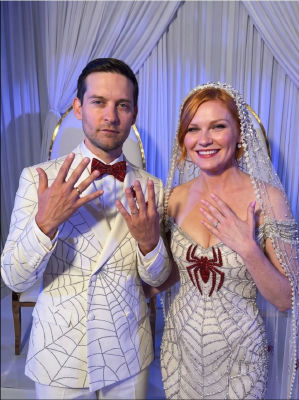 AI-generated image of Tobey Maguire and Kirsten Dunst in Spider-Man themed wedding attire