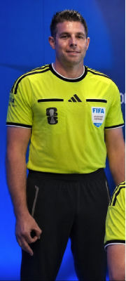 AI-generated image of Jorge Corrula in a FIFA assistant referee uniform