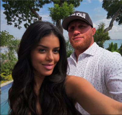 AI-generated image of Justin Gaethje and a woman in a tropical selfie