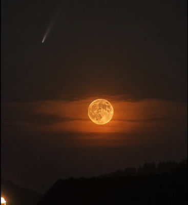 AI-generated image of a full moon and a comet in the night sky