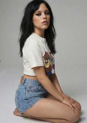 AI-generated image resembling Jenna Ortega in Tasmanian Devil t-shirt and denim shorts