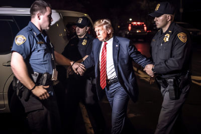AI-generated image of Donald Trump being detained by police officers