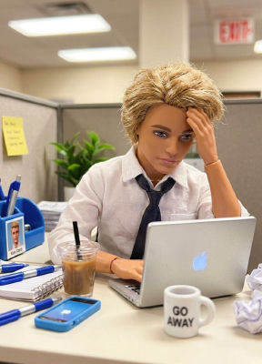 AI-generated image of a Ken doll stressed at an office desk