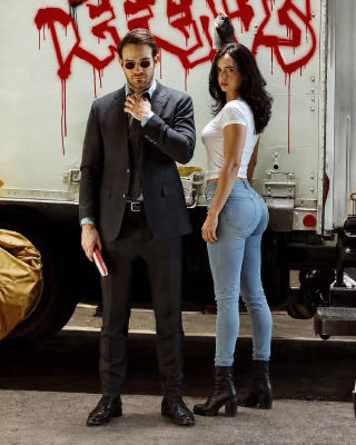 AI-generated image of Charlie Cox and Krysten Ritter posed in front of a 'Daredevil' graffiti truck